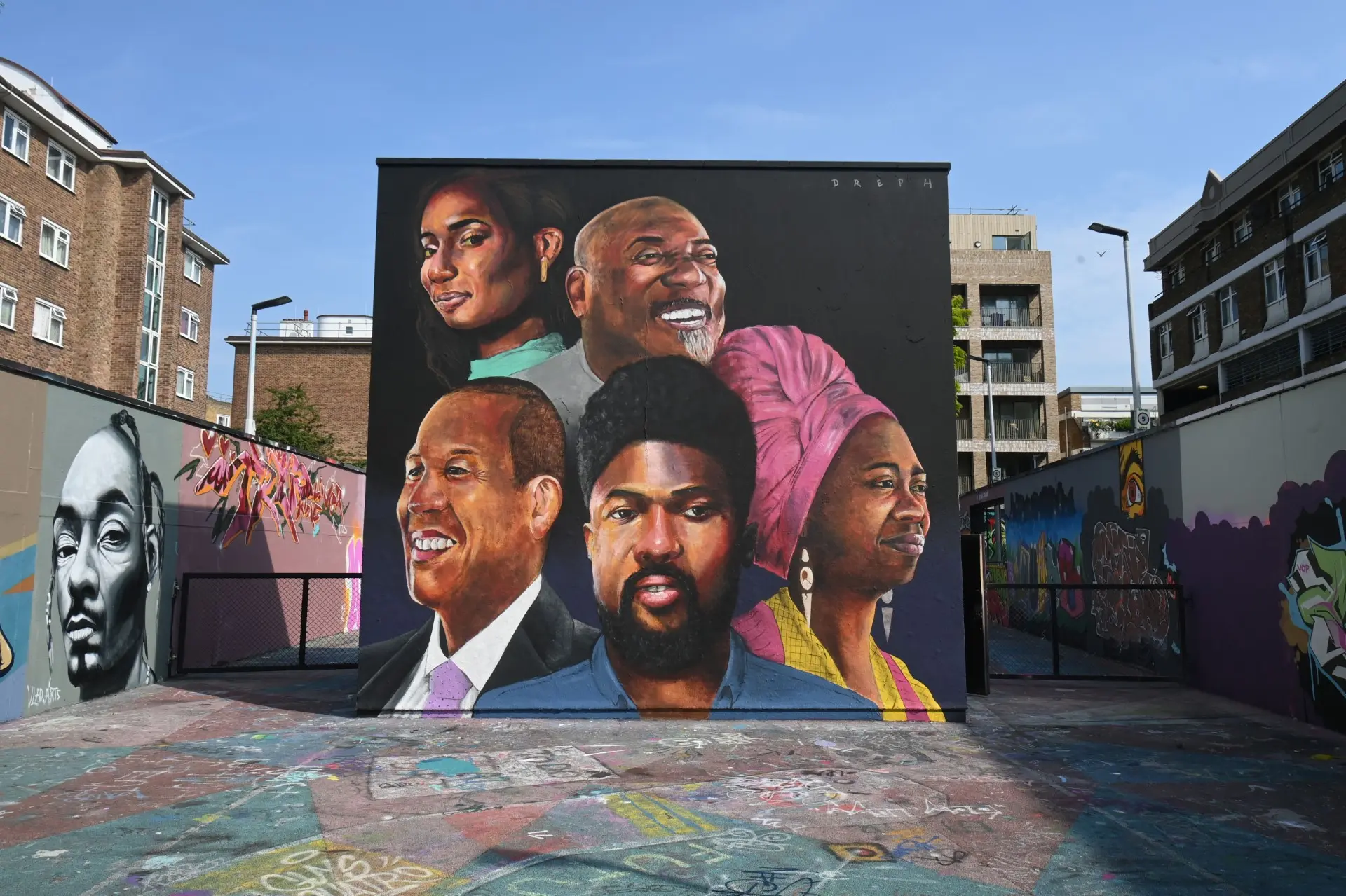 Mural of 5 black heritage blood donors who are the face of NHS campaign. There are 3 men and 2 ladies.